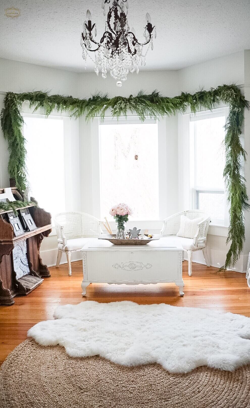 Fresh garland hung over a bay window