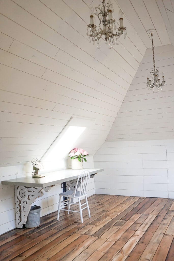 Concrete desk made with antique corbels for legs  in a finished attic space 