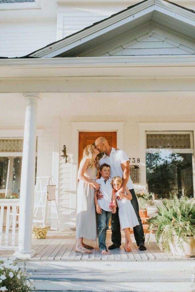 family goals with a family on the front porch