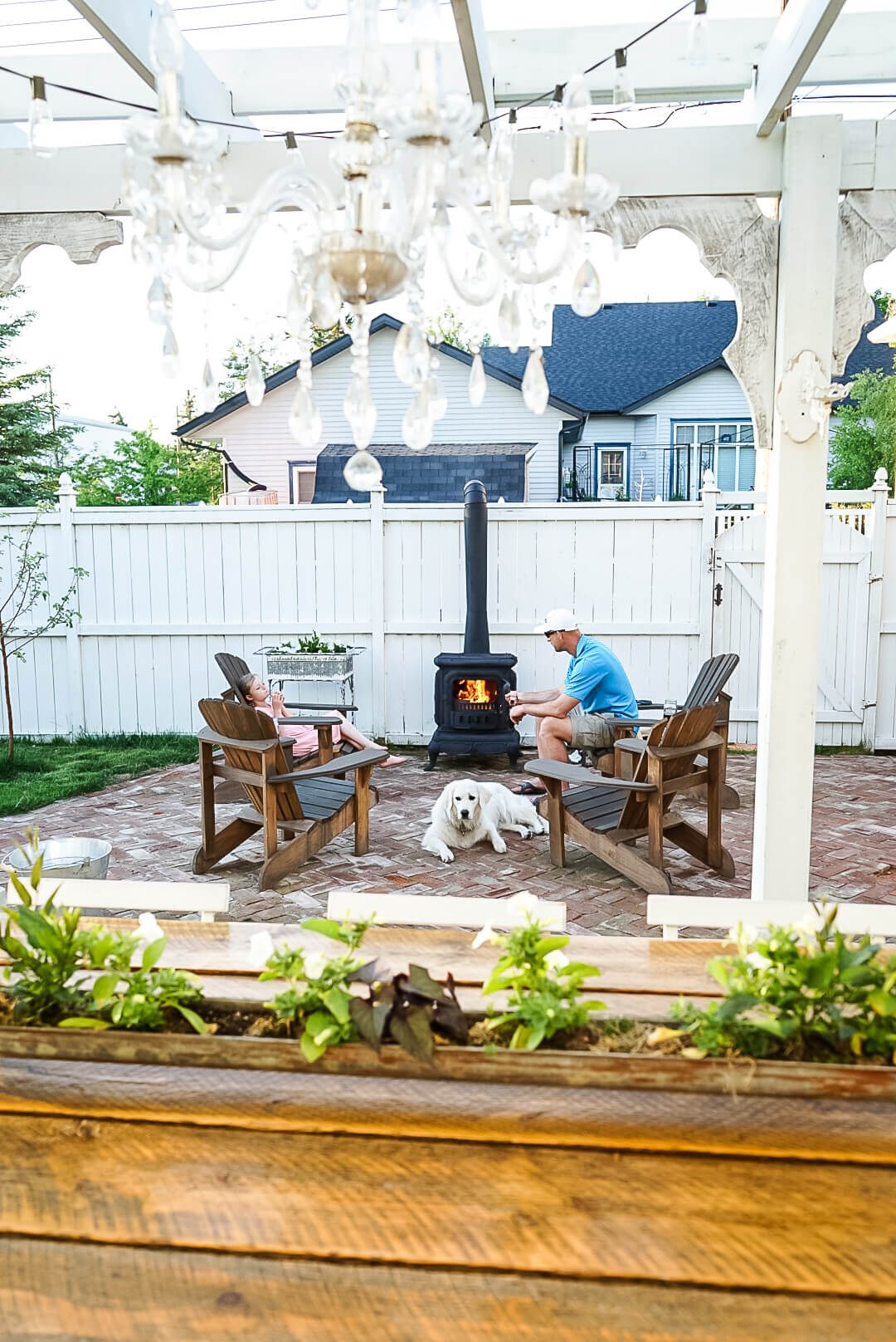 family spending time around the fire