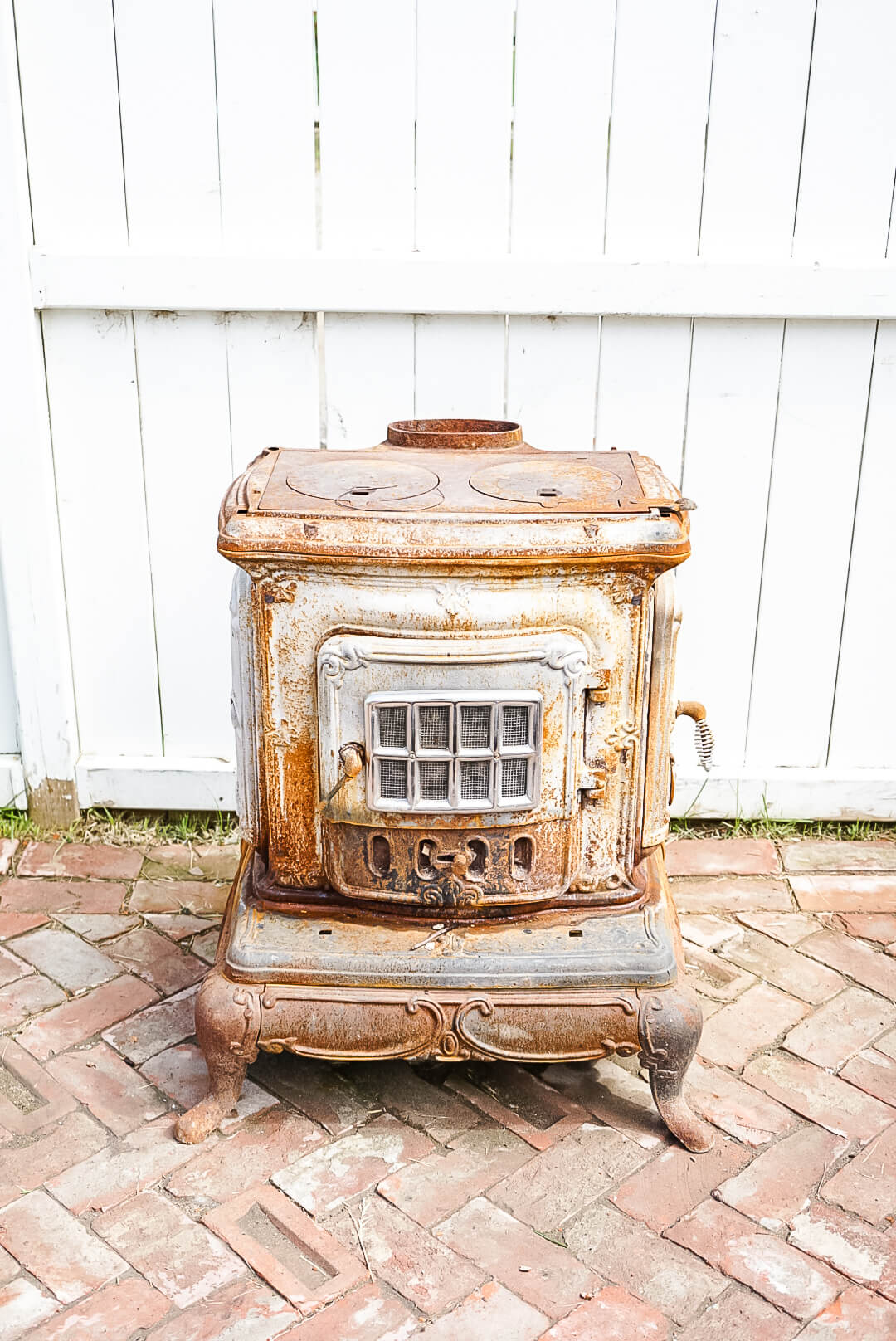 outdoor wood burning fireplace before picture