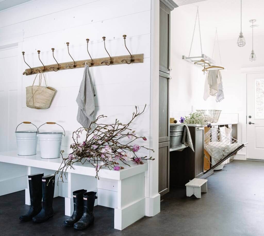 View of a laundry room and mudroom in a farmhouse.