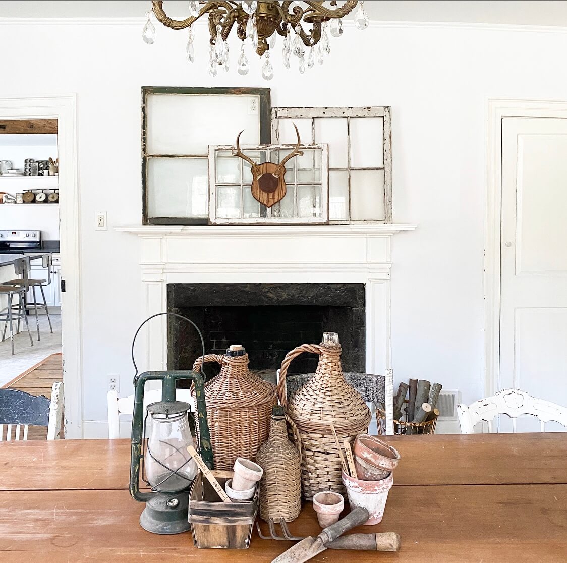 little white farmhouse 8 antique farmhouse decor style layered windows on mantel