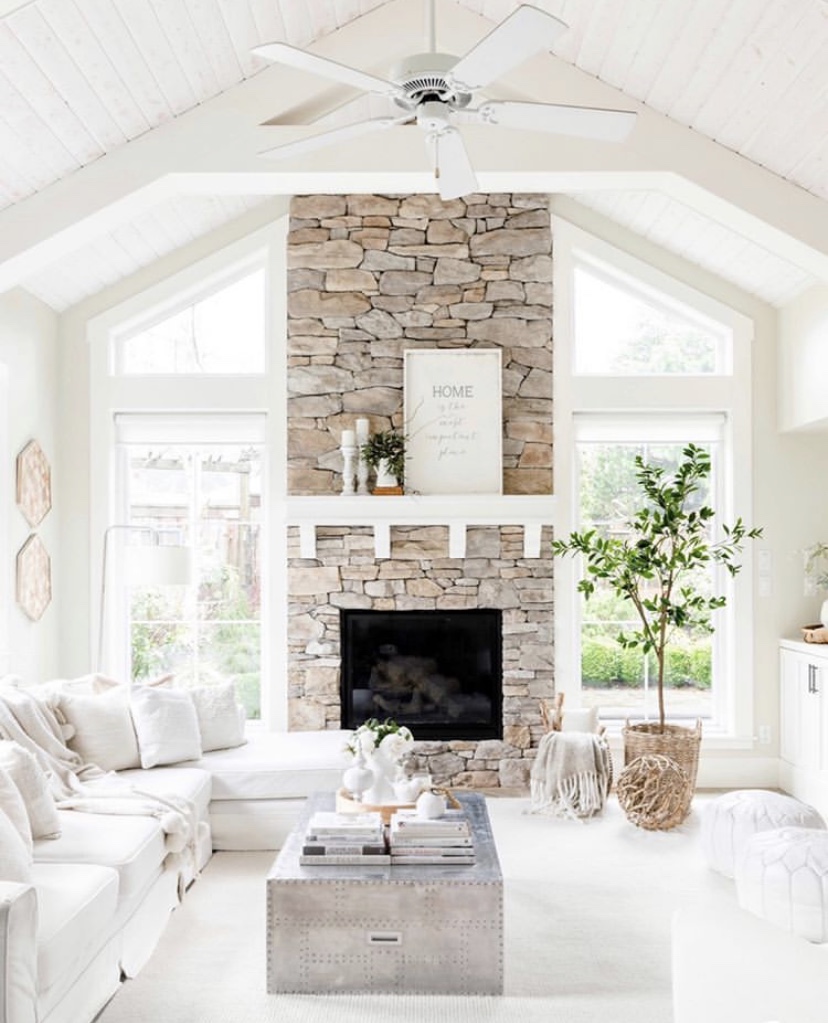 IMG_1550 open concept living room brick fire place white mantel