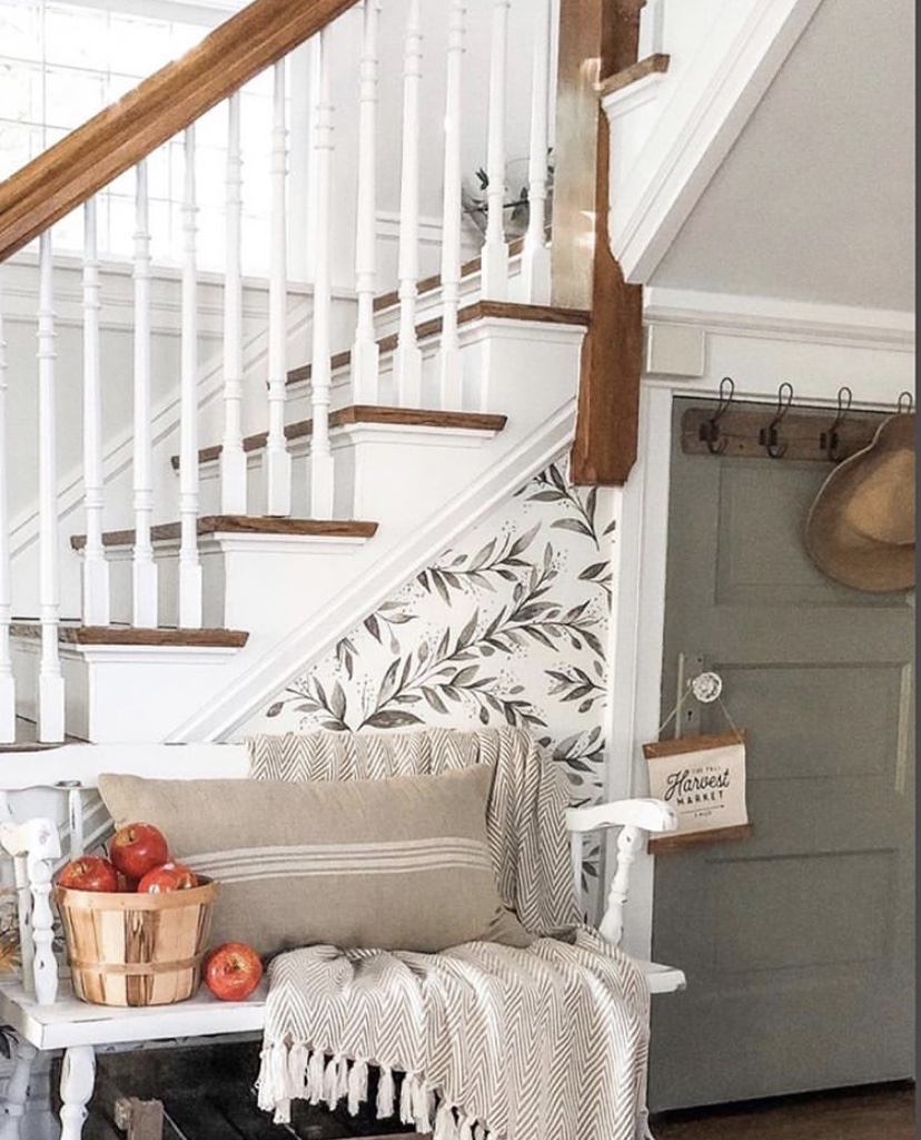 front entry cozy farmhouse fall decor apples wallpaper staircase