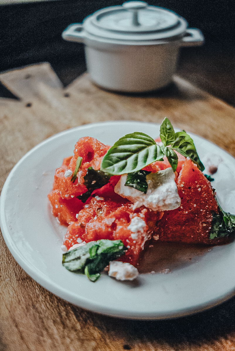 watermelon basil salad-1 a ironstone plate of watermelon salad
