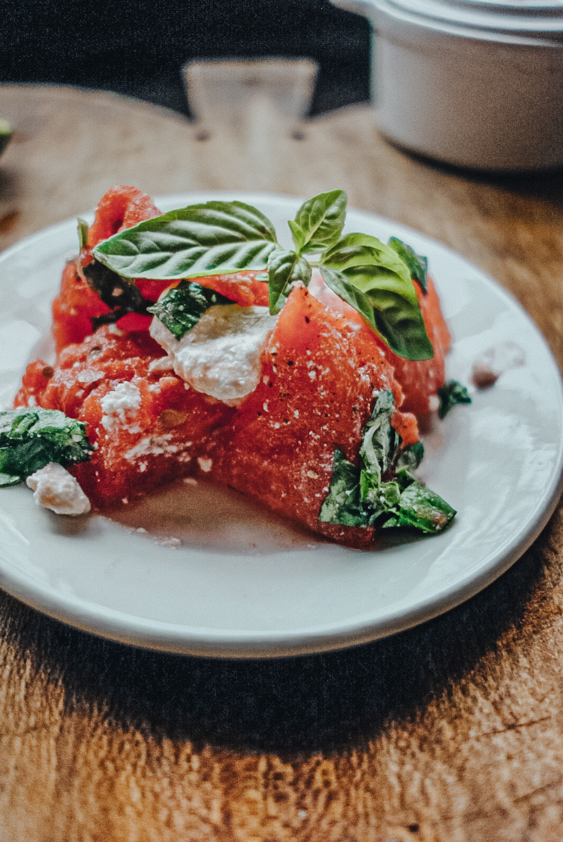 watermelon basil salad-2 watermelon basil salad on an ironstone plate