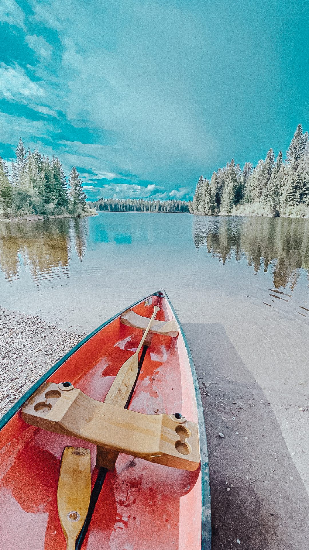 canoe on the lake out at the tiny house