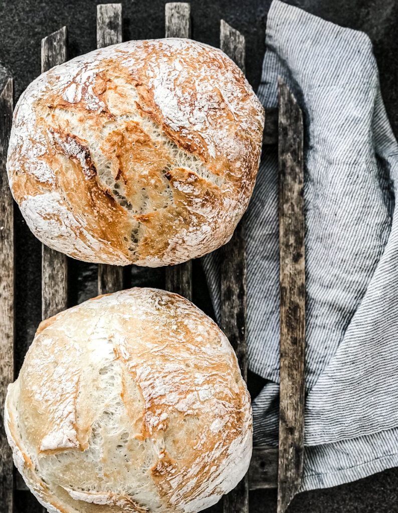 artisan french bread on a linen kitchen towel