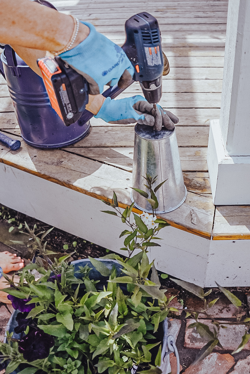  drilling out a galvanized tin pot for proper drainage