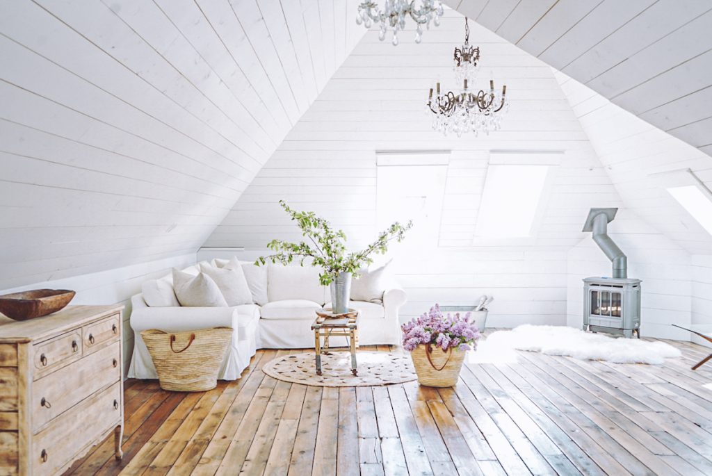 vaulted ceiling in a attic loft space that has shiplap walls
