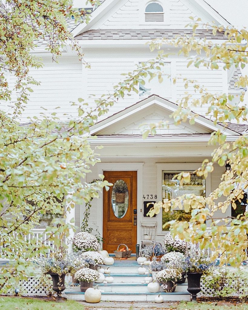 historic house with a fall front porch
