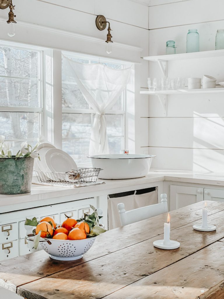 fresh oranges used as decorations for winter in a cabin