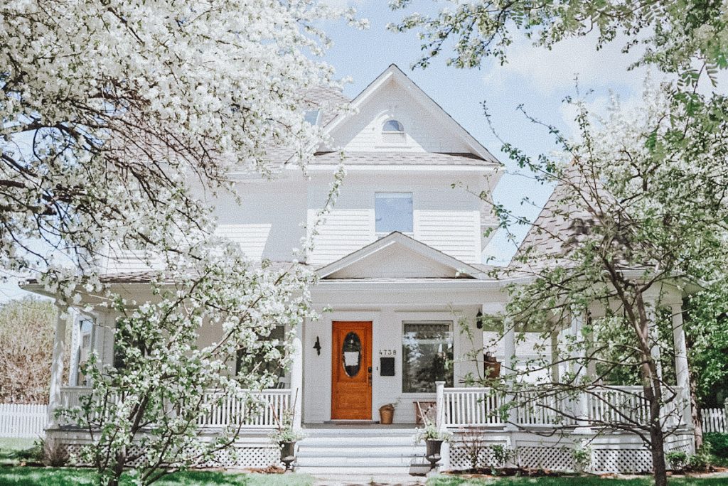 Historic Victorian home painted with Oxford White By Benjamin Moore on the exterior