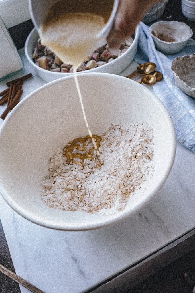 adding melted butter to a crumble topping