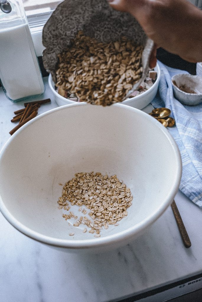 mixing oats for a crumble topping