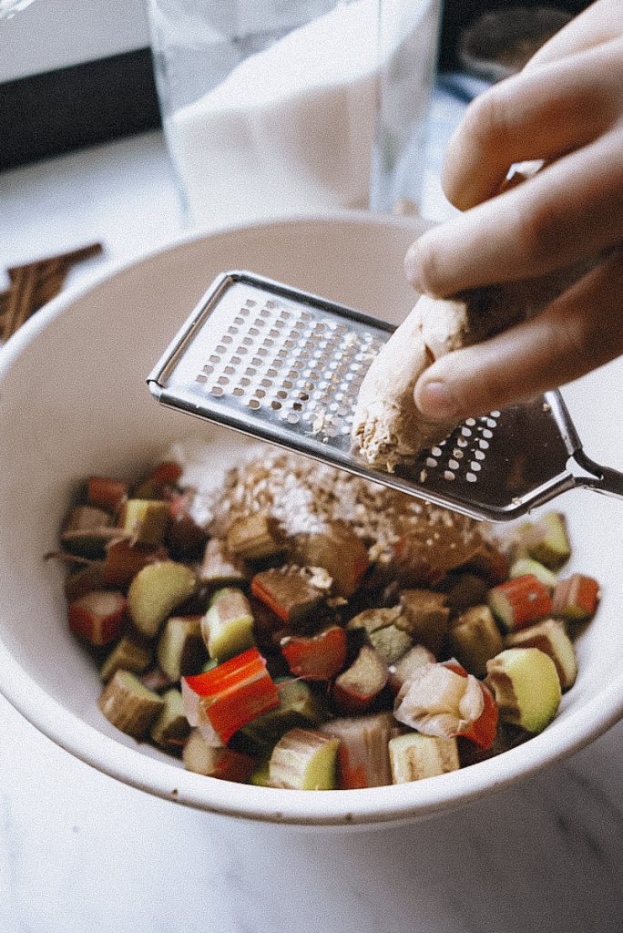 grating ginger to make a crumble