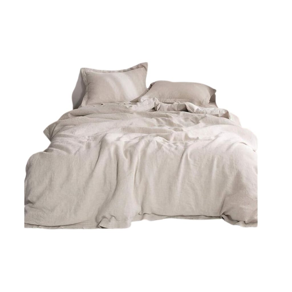 Washed linen bedding in neutral color.