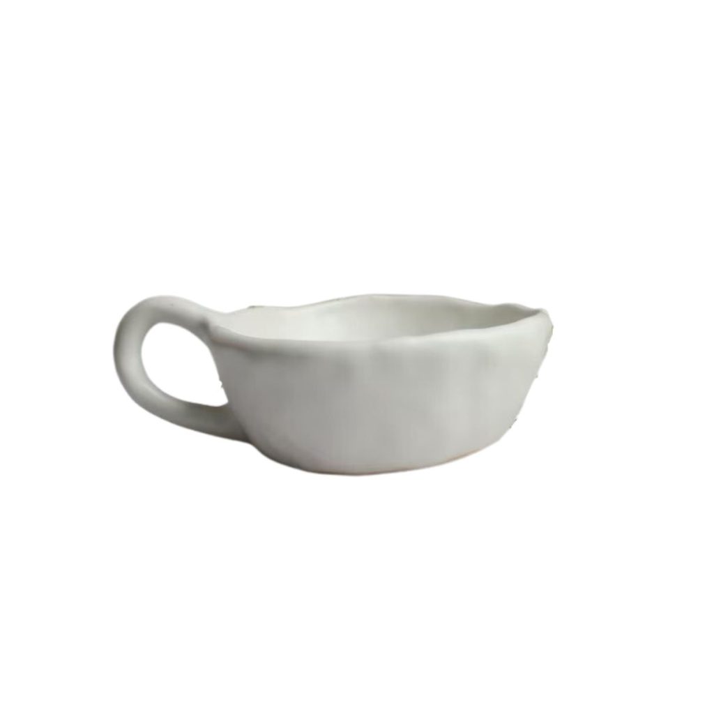 White hand pinched mug.