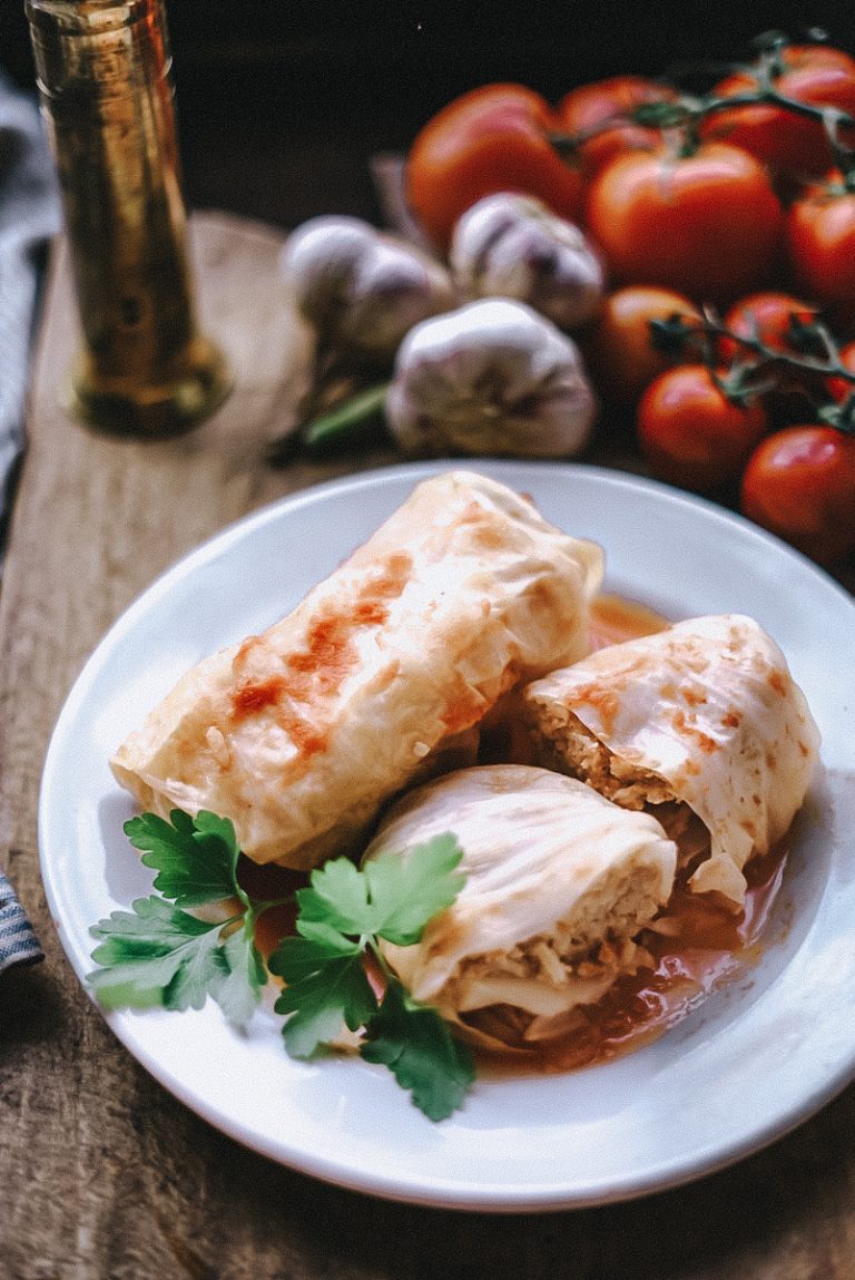 Cut stuffed cabbage rolls plated and ready to be eaten.