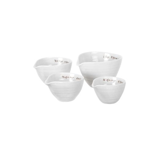 White stoneware measuring cups.