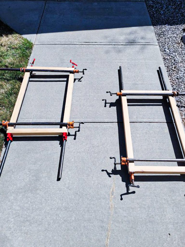 A DIY wooden window being built for a renovation.