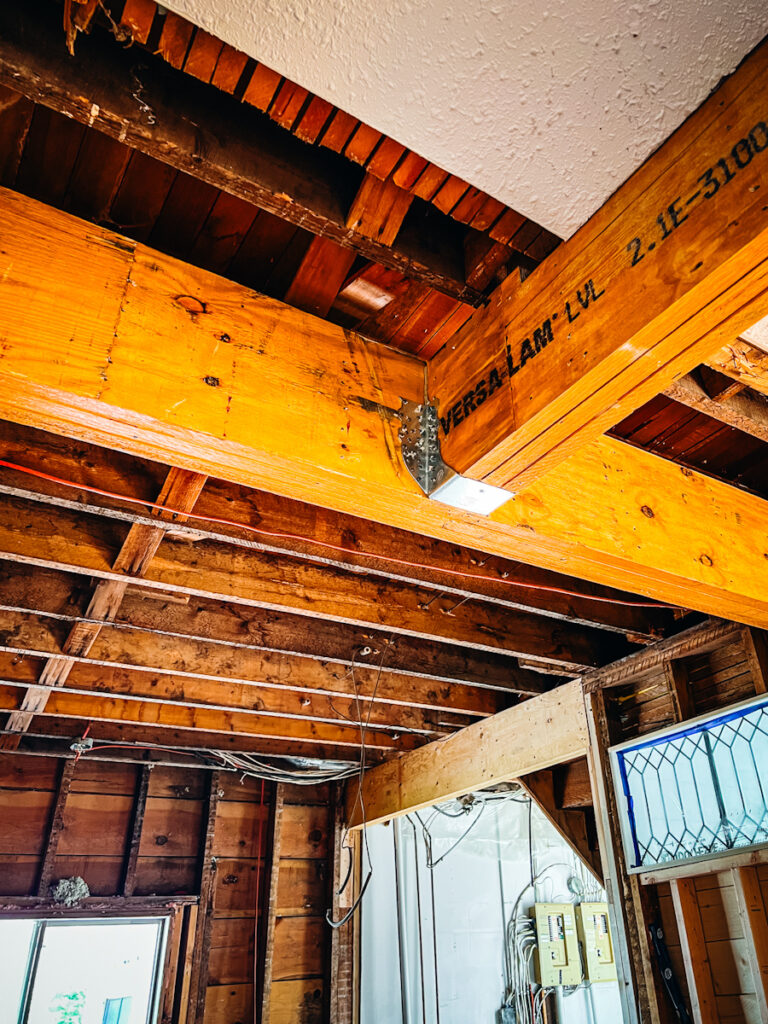Two large beams connecting together after removing two walls in a renovation.
