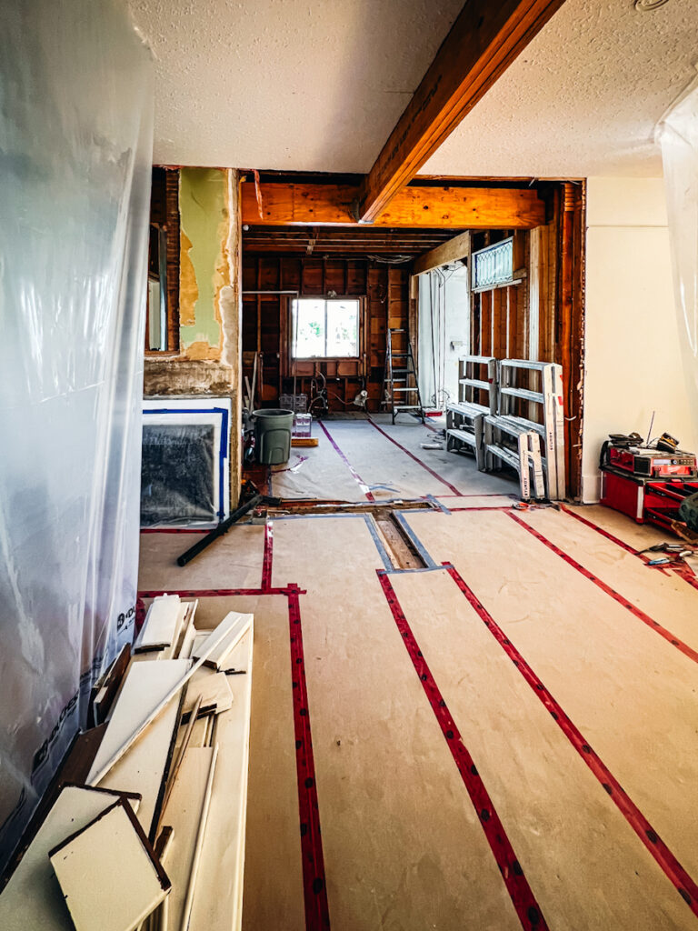 The new layout of an old house that has had walls removed to make it more open.