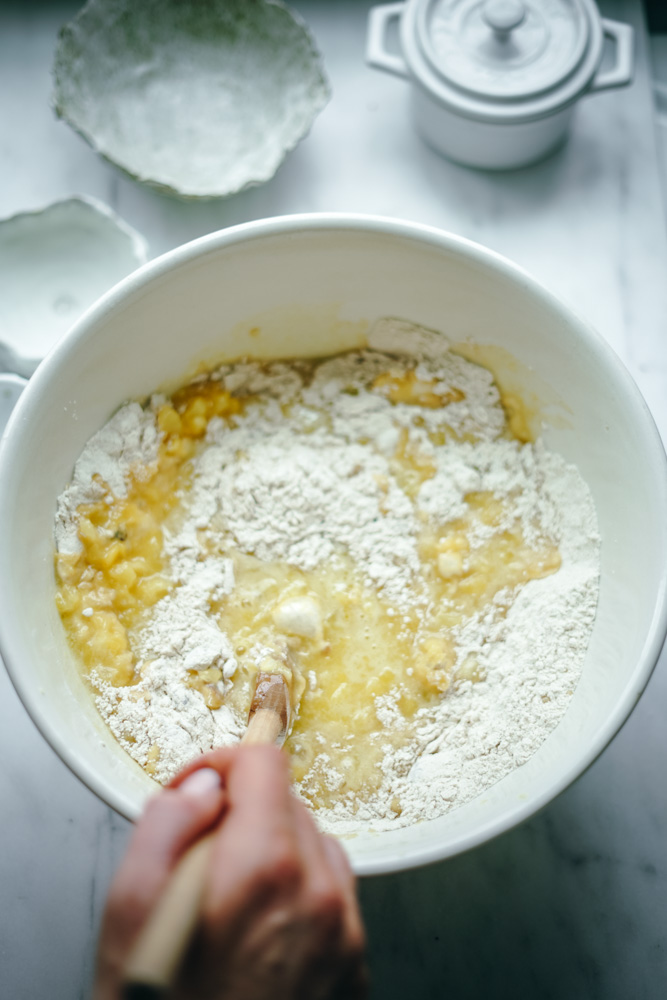 Mixinging together the ingredients to make the pineapple bread.