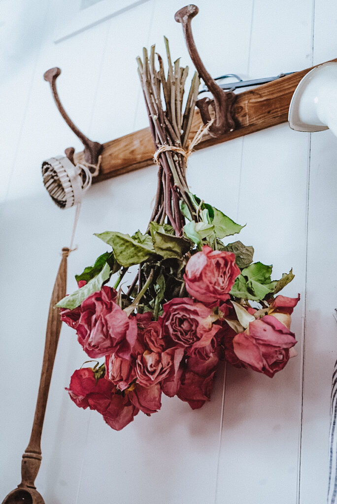 Hanging roses from a special occasion to preserve.