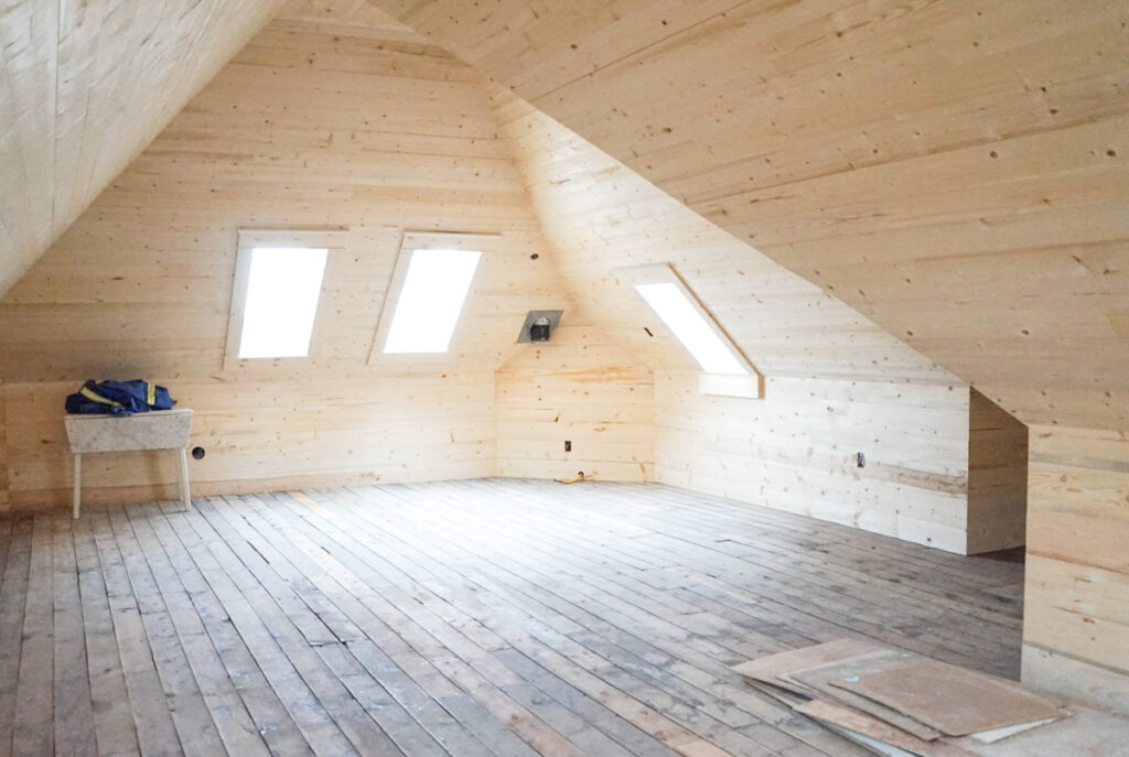 Adding shiplap to the walls in an attic space and refinishing the floors.