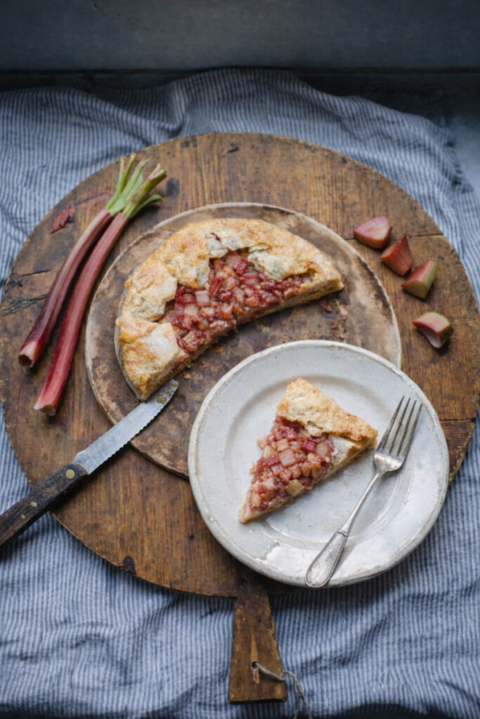Cut the Rustic Rhubarb Galette that's just come out of the oven. 