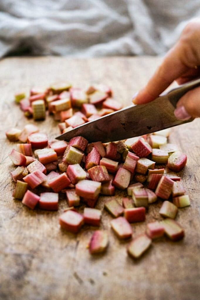 Chopping up rhubarb to make homemade rhubarb juice. 