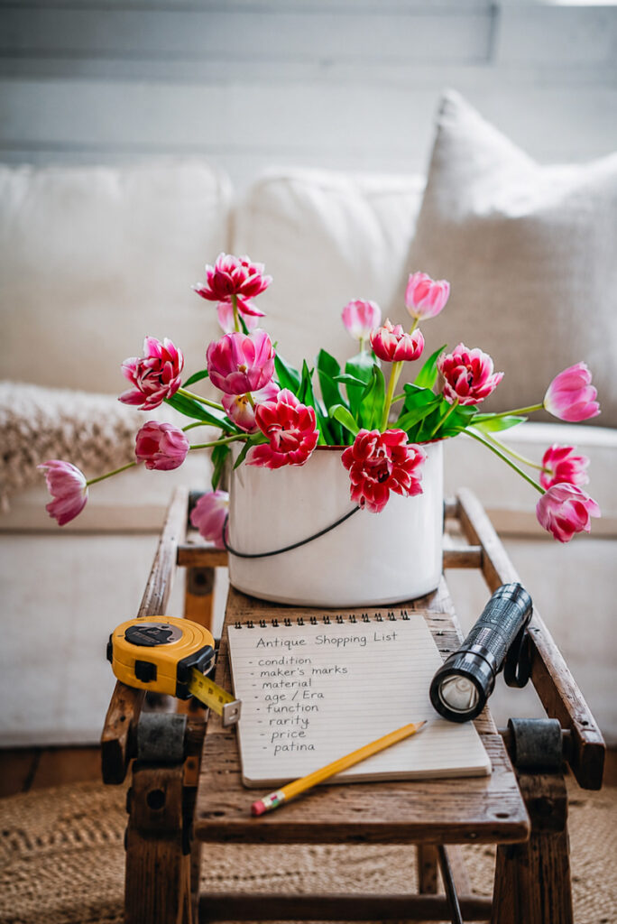 A toolkit you take with you antiquing, including:
- a notebook
- a magnet
- a measuring tape
- a flashlight
- a pencil