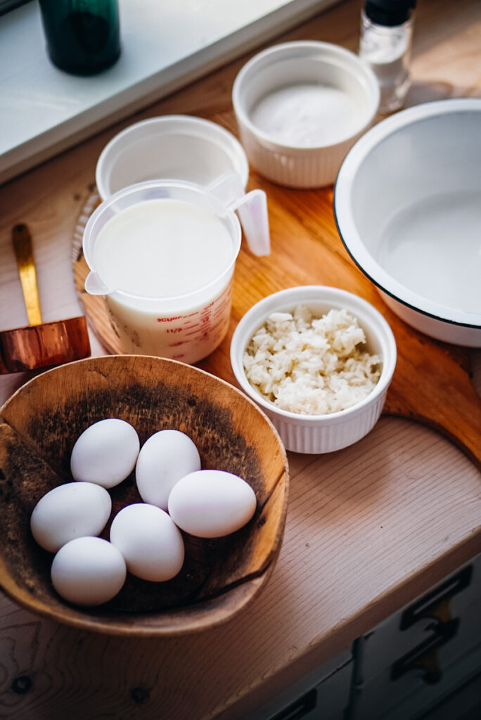 All the ingredients used to make baked rice pudding.